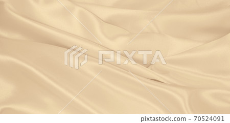Smooth elegant golden silk or satin luxury cloth texture as wedding background. Luxurious background design. In Sepia toned. Retro style Smooth elegant golden silk or satin luxury cloth texture as wedding background. Luxurious background design. In Sepia toned. Retro style 70524091