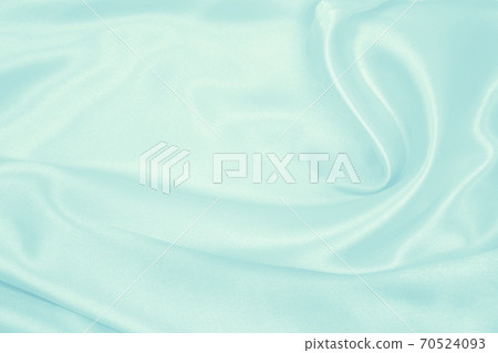 Smooth elegant blue silk or satin luxury cloth texture as abstract background. Luxurious background design Smooth elegant blue silk or satin luxury cloth texture as abstract background. Luxurious background design 70524093
