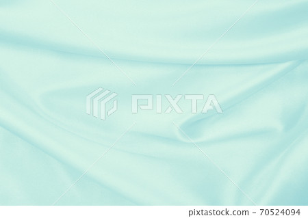 Smooth elegant blue silk or satin luxury cloth texture as abstract background. Luxurious background design Smooth elegant blue silk or satin luxury cloth texture as abstract background. Luxurious background design 70524094