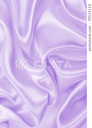 Smooth elegant lilac silk or satin texture as wedding background. Luxurious background design Smooth elegant lilac silk or satin texture as wedding background. Luxurious background design 70524119