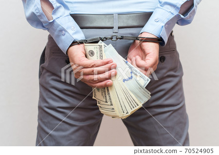 banknote, businessman, handcuff 70524905