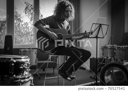 Musician Record Song With Acoustic Guitar . Musician Record Song With Acoustic Guitar . 70527541