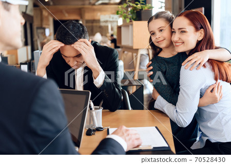 Happy red-haired woman took custody of daughter.  70528430