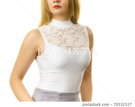 Woman wearing white top 70532527