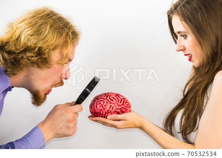 Man and woman discovering brain Man and woman discovering brain 70532534