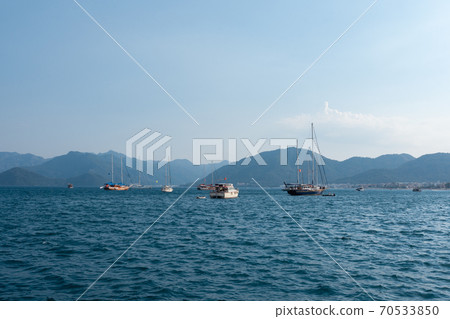 Yachts, boats and sailboats floating in the Bay Yachts, boats and sailboats floating in the Bay 70533850