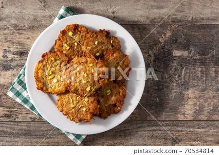 Traditional Jewish latkes or potato pancakes 70534814