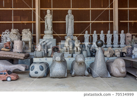 Traditional commemorative tombstones and tomb decoratons for sale in Kanazawa city, Ishikawa Prefecture, Western Japan. 70534999