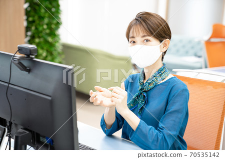 Young woman heading to the webcam 70535142