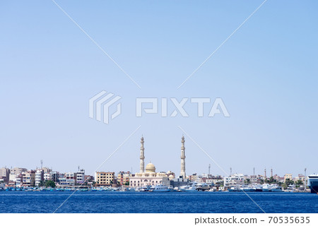 Sea bay with parked speed boats near Hurghada Mosque. Sea bay with parked speed boats near Hurghada Mosque. 70535635