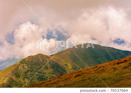 The Montenegrin ridge and all the magic of the mountains, picturesque landscapes, mysterious clouds, the majestic mountains of Ukraine. The Montenegrin ridge and all the magic of the mountains, picturesque landscapes, mysterious clouds, the majestic mountains of Ukraine. 70537064