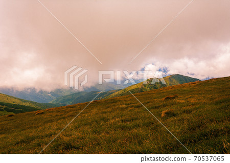 The Montenegrin ridge and all the magic of the mountains, picturesque landscapes, mysterious clouds, the majestic mountains of Ukraine. The Montenegrin ridge and all the magic of the mountains, picturesque landscapes, mysterious clouds, the majestic mountains of Ukraine. 70537065