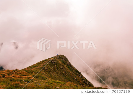 Montenegrin ridge in the clouds, Gutyn Tomnatyk mountain in the clouds, picturesque and fascinating magical landscapes from the mountain to the valleys. 70537159