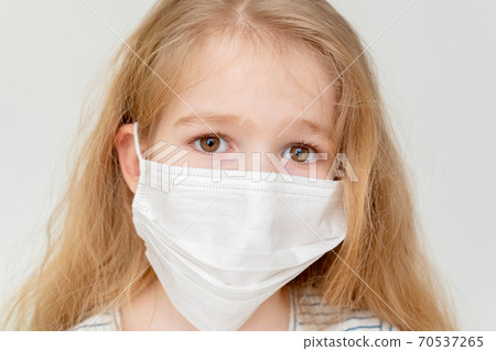 close up small girl medical mask white background close up small girl medical mask white background 70537265