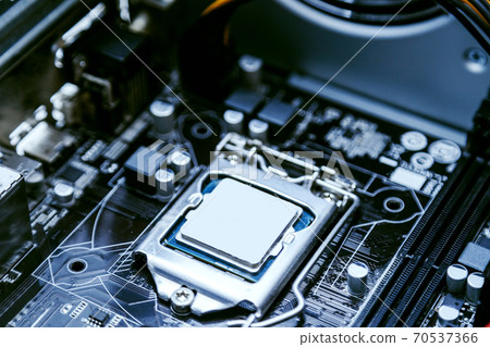 Motherboard of a personal computer, processor close-up. Modern technologies, computer architecture Motherboard of a personal computer, processor close-up. Modern technologies, computer architecture 70537366