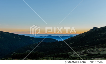 Sunrise in the Carpathians near Mount Pip Ivan, the saddle of Montenegro, a camping town in the saddle. Sunrise in the Carpathians near Mount Pip Ivan, the saddle of Montenegro, a camping town in the saddle. 70537502