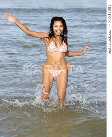 cheerful girl in the sea 70538083