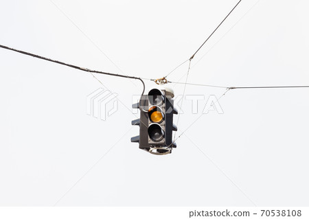 A snow covered suspended amber traffic light is pictured in mid winter in Salzburg, Austria. A snow covered suspended amber traffic light is pictured in mid winter in Salzburg, Austria. 70538108
