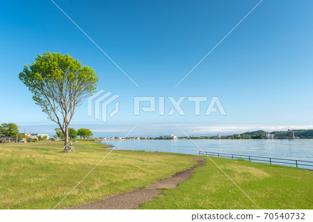 Image of enjoying cycling at Togo Pond Image of enjoying cycling at Togo Pond 70540732