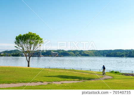 Image of enjoying cycling at Togo Pond 70540735