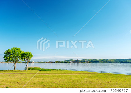 Image of enjoying cycling at Togo Pond Image of enjoying cycling at Togo Pond 70540737