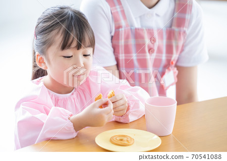 Childcare image Portrait of a nursery teacher and a girl Childcare image Portrait of a nursery teacher and a girl 70541088