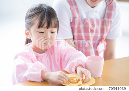 Childcare image Portrait of a nursery teacher and a girl Childcare image Portrait of a nursery teacher and a girl 70541089