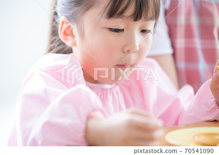 Childcare image Portrait of a nursery teacher and a girl Childcare image Portrait of a nursery teacher and a girl 70541090