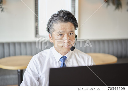 Male business having an online meeting 70545309