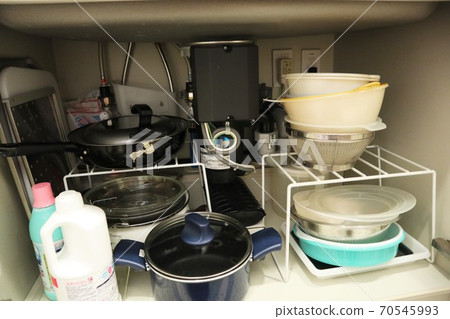 There is a disposer (garbage crusher) pot under the sink 70545993