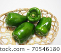 Peppers in a basket Peppers in a bamboo colander 70546180