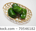 Peppers in a basket Peppers in a bamboo colander 70546182