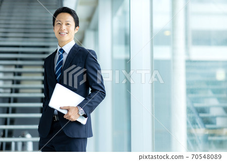 Refreshing businessman image 70548089