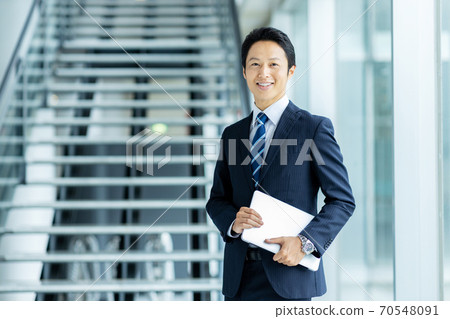 Refreshing businessman image 70548091