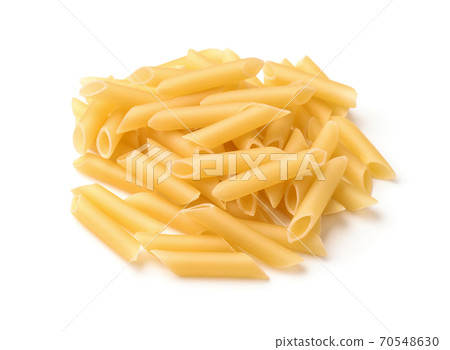 Pile of uncooked penne pasta 70548630