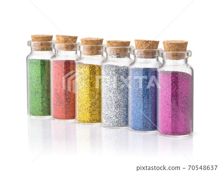 Row of colorful glitter bottles Row of colorful glitter bottles 70548637