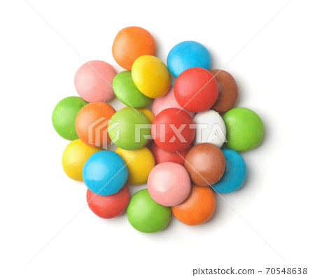 Pile of colorful glazed button candies 70548638