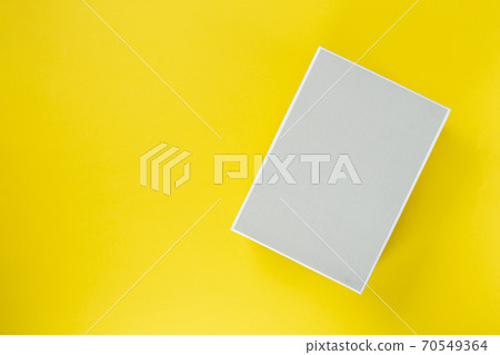 Light box on a yellow background. Space for text. Light box on a yellow background. Space for text. 70549364