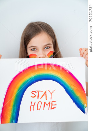 stay home. teen girl drew rainbow and poster stay home. teen girl drew rainbow and poster 70551724