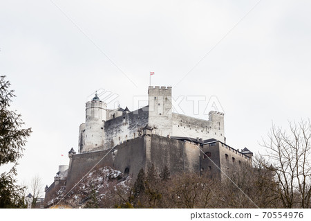 A close up mid winter view of Hohensalzburg Fortress, Salzburg, Austria.  The fortress sits atop the Festungsberg a small hill. 70554976