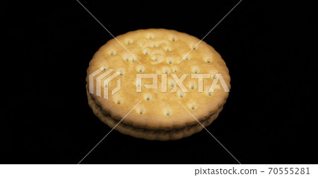 Golden cookies filled with chocolate for children 70555281