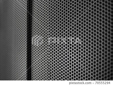 Protective grid close-up of an amplifier as a wallpaper 70555294