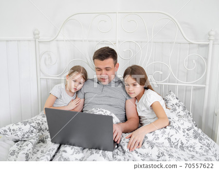 freelancer quarantined with children in bedroom. freelancer quarantined with children in bedroom. 70557622