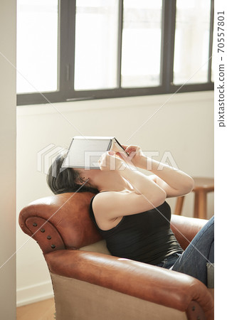 Young woman enjoying leisure on holidays 70557801