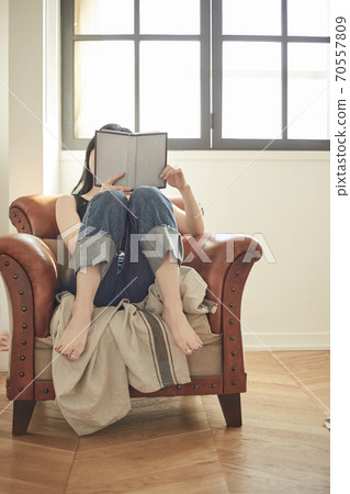 Young woman enjoying leisure on holidays Young woman enjoying leisure on holidays 70557809