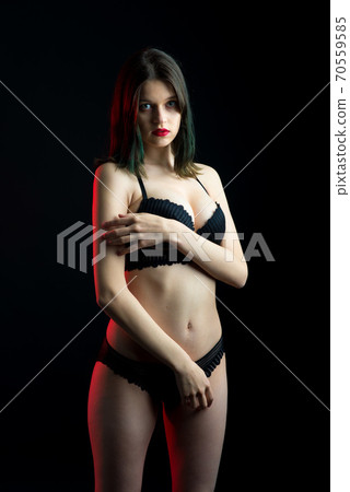 Vertical view photo beautiful shy lady in lace bikini boudoir bra panties. 70559585