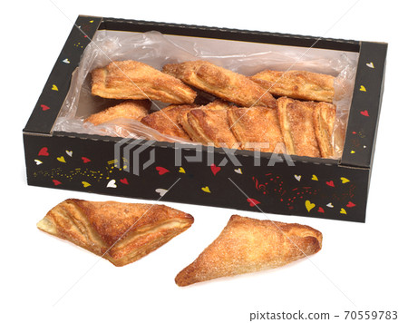 Puff pastry with raspberry filling 70559783