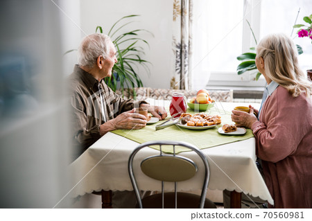 Couple enjoying a breakfast together 70560981