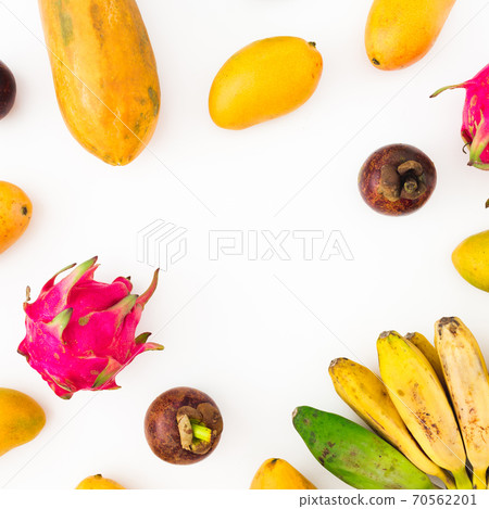 Fruits background of banana, papaya, yellow mango with mangosteen and dragon fruit on white 70562201