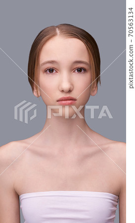 Young woman cosmetology portrait. Beauty girl face Young woman cosmetology portrait. Beauty girl face 70563134